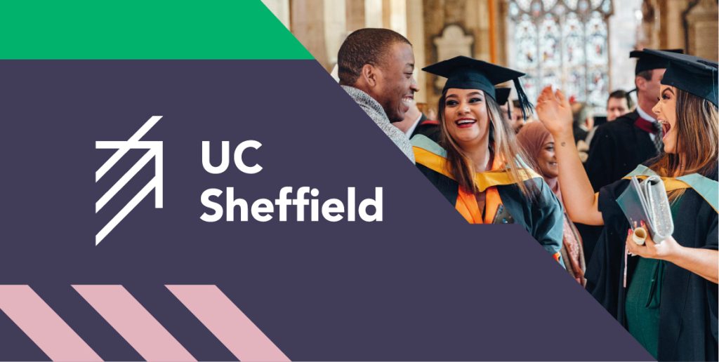 Graduates celebrating at UC Sheffield ceremony, wearing robes and caps with smiles and excitement in historic venue